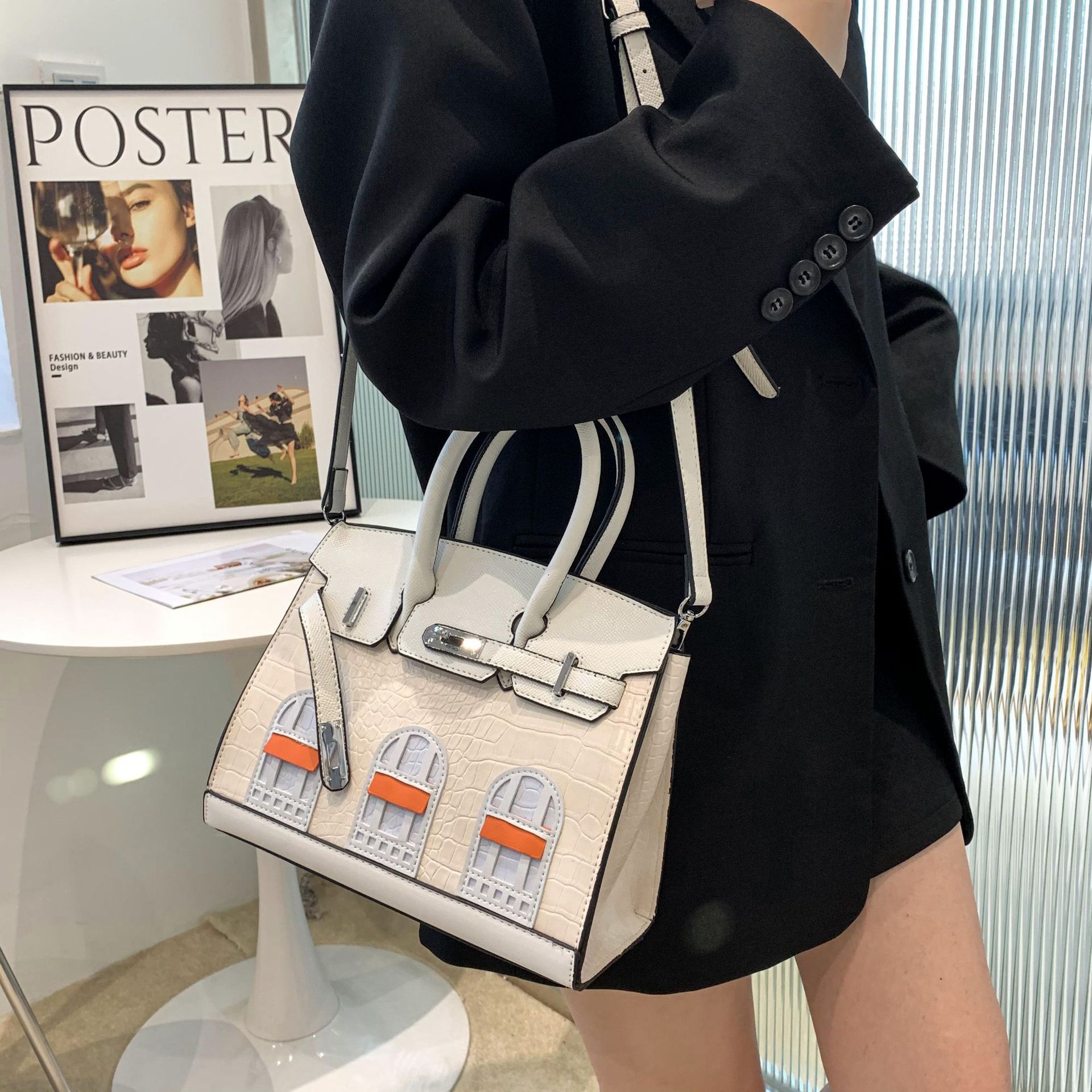 2025 Free Shipping Designer Luxury Women Fashionable color blocked small house bag versatile hand held crossbody bag for women