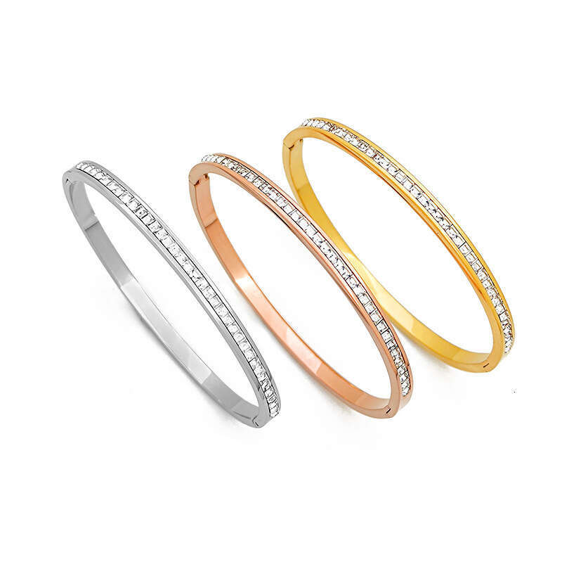 DHCollections Elegant Crystal Bangle Bracelet Stainless Steel Luxe Star inspired Stackable Cuff for Women