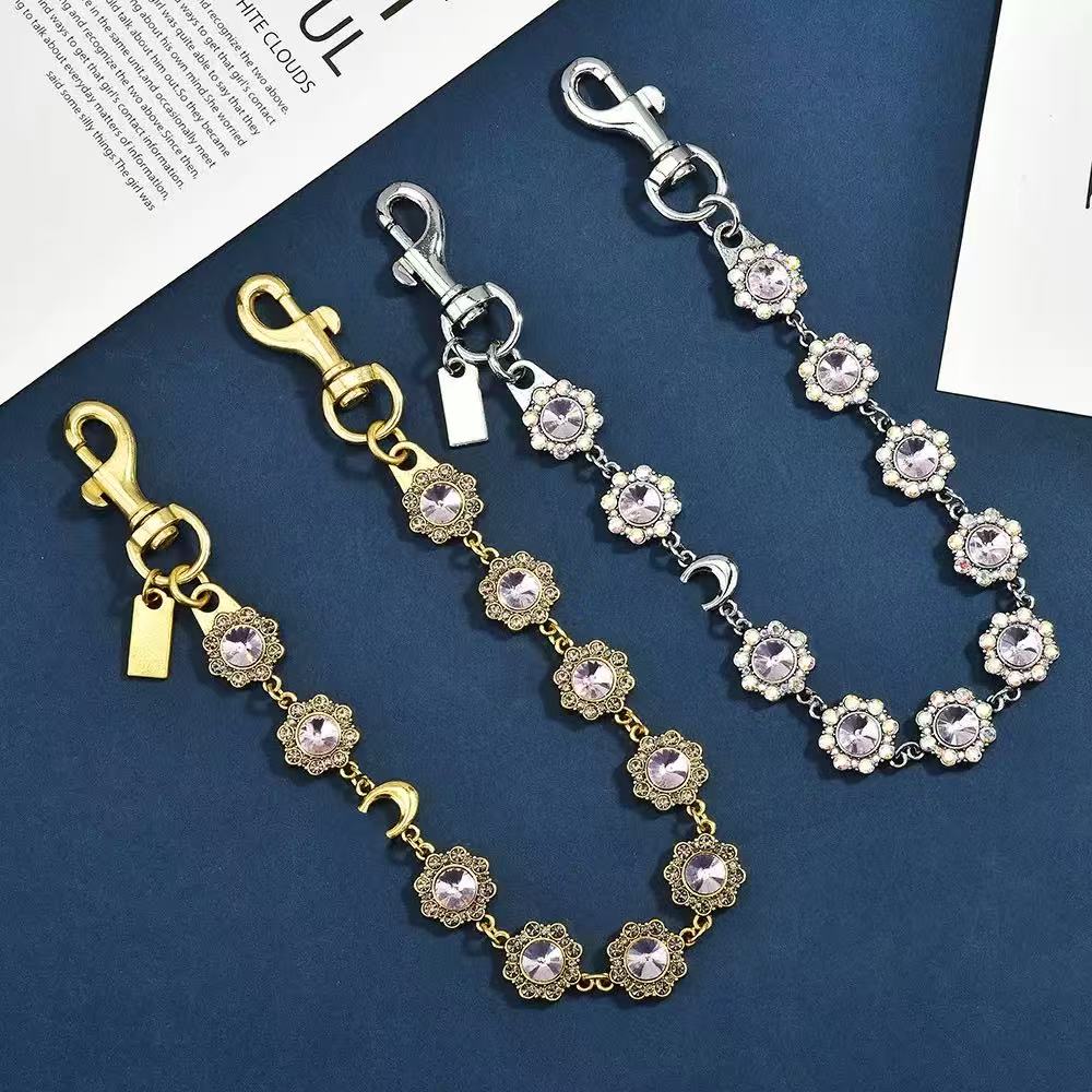 Luxurys designer keychain lanyards Co ch Elliptical carved water diamond buckle keychain for men women key chain charm bag keyring fashion Bag Parts Accessories