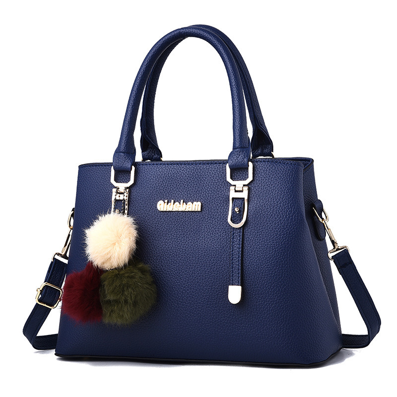 Designer's 2025 New European And American Fashion Large Capacity Women's Handbag Pom Pom Single Shoulder Crossbody Bag Wholesale Free Shippi