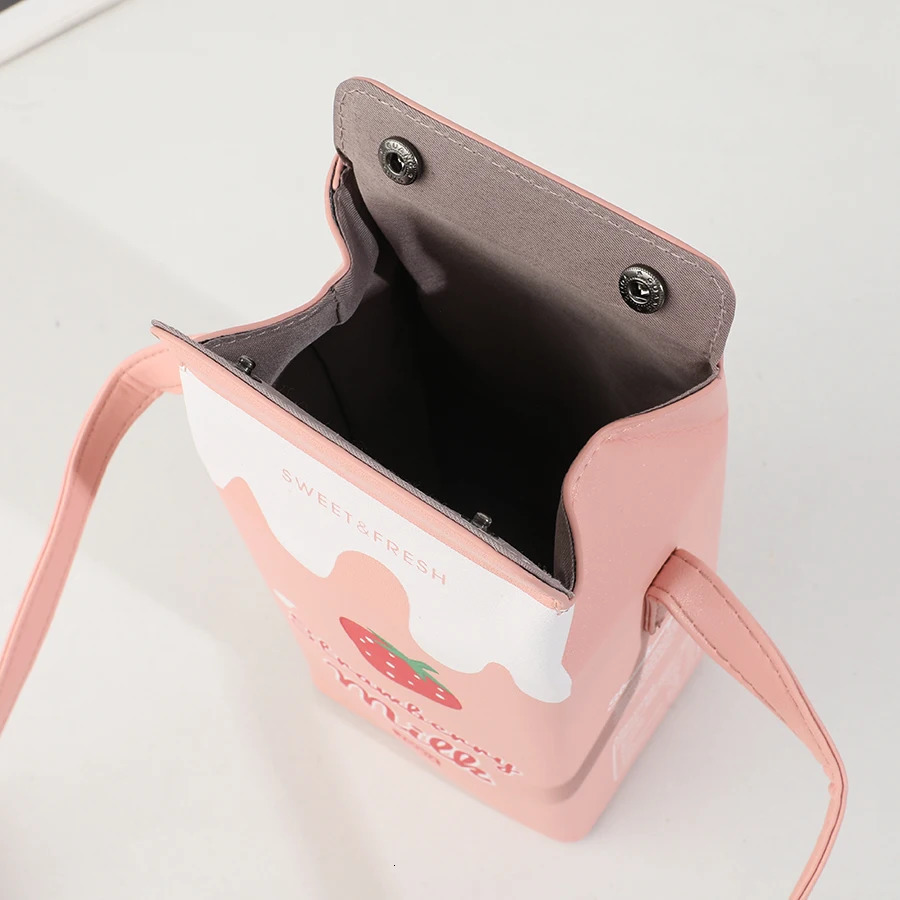 Fashion cartoon milk carton shape ladies shoulder bag cartoon mobile phone bag. 250628