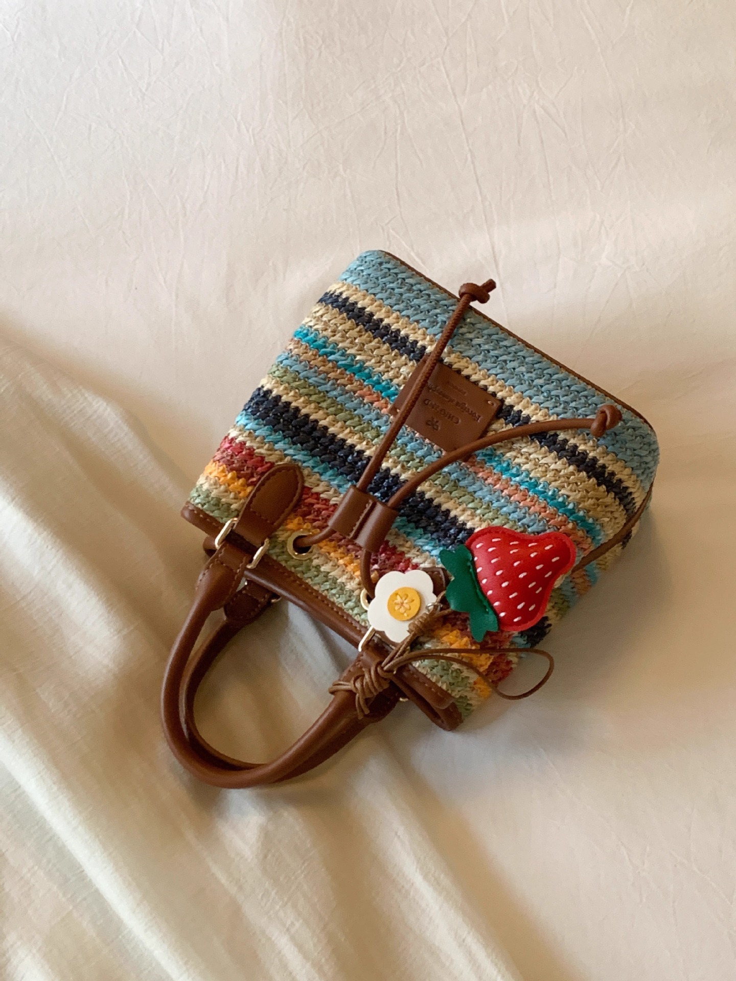 Rainbow colored women's bucket 2025 new woven handbag sweet and versatile spring outing crossbody bag