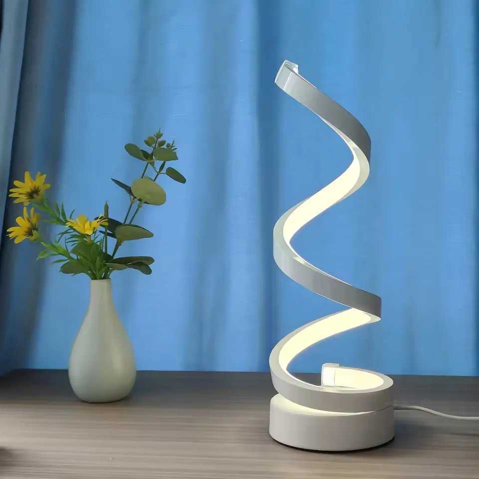 Modern elegant white spiral desktop lamp powered by USB with three-color dimming suitable for various types of rooms. XJ250703