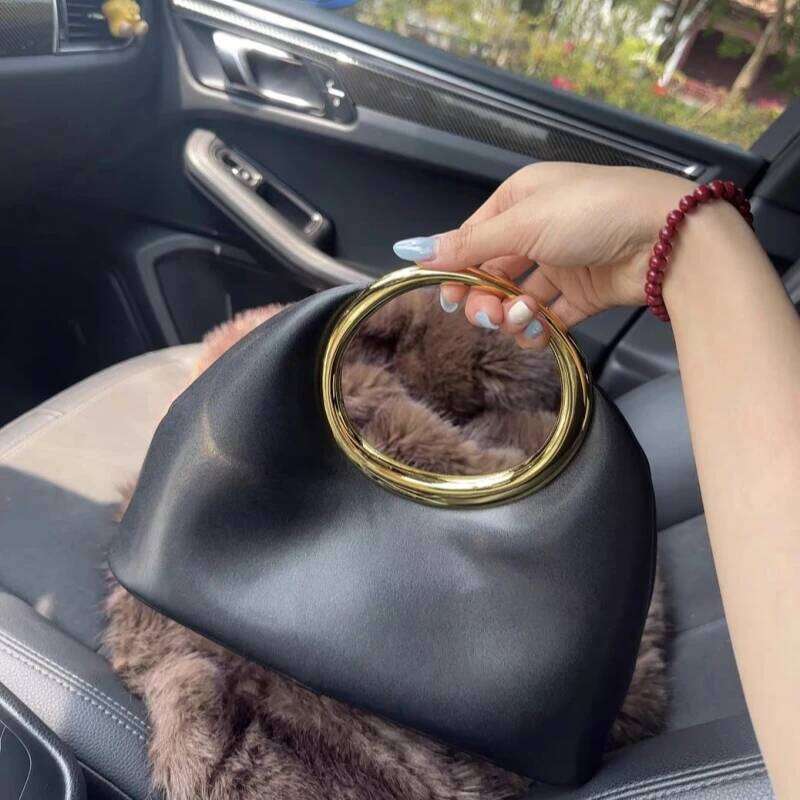 Luxurious designer's spring 2025 collection women's metal handle handbag, half-moon shaped bag in cloud-like design