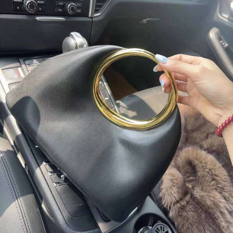 Luxurious designer's spring 2025 collection women's metal handle handbag, half-moon shaped bag in cloud-like design