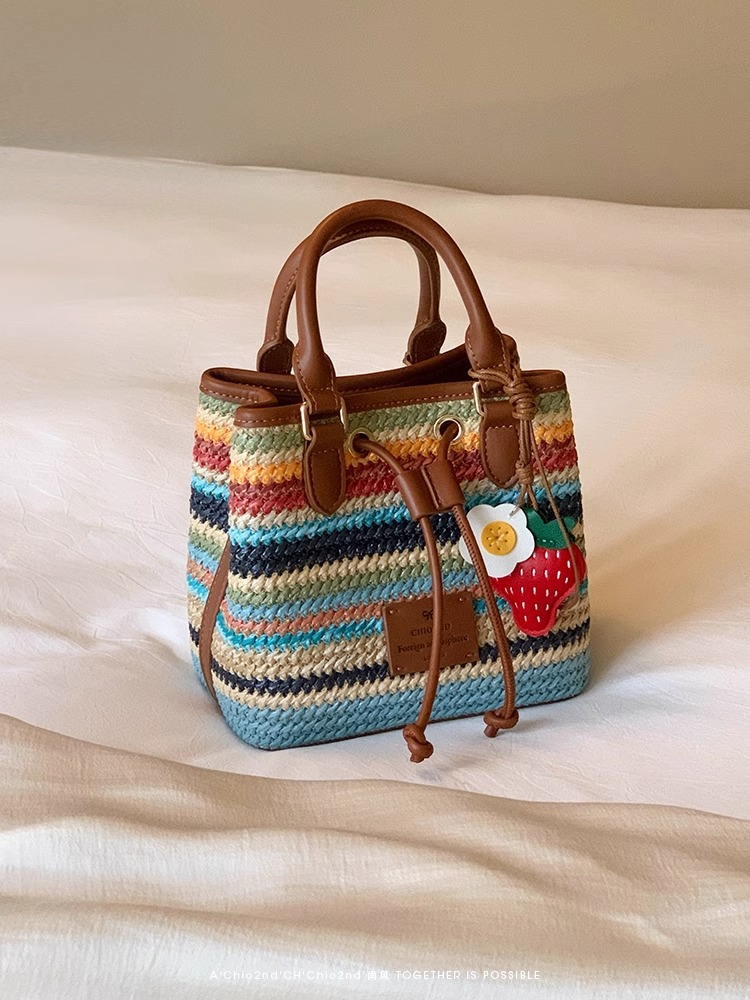 Rainbow colored women's bucket 2025 new woven handbag sweet and versatile spring outing crossbody bag