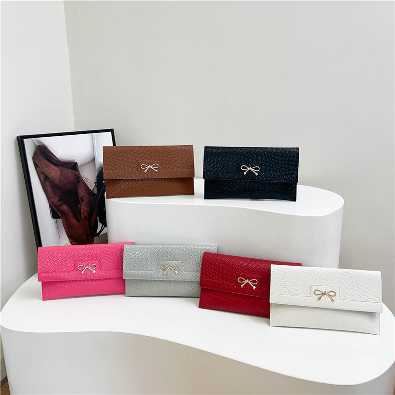 Free Shipping Designer Bag High-end Trendy Personality Fashion Evening Bag For Women Elegant Light Luxury New Urban Commuter Textured Clutch