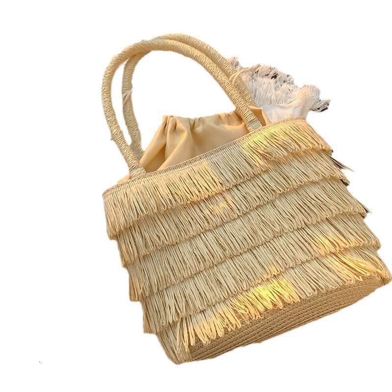 Pastoral Style Handmade Straw Handbag for Women Summer 2025 New French Beach Tassel Woven Bag