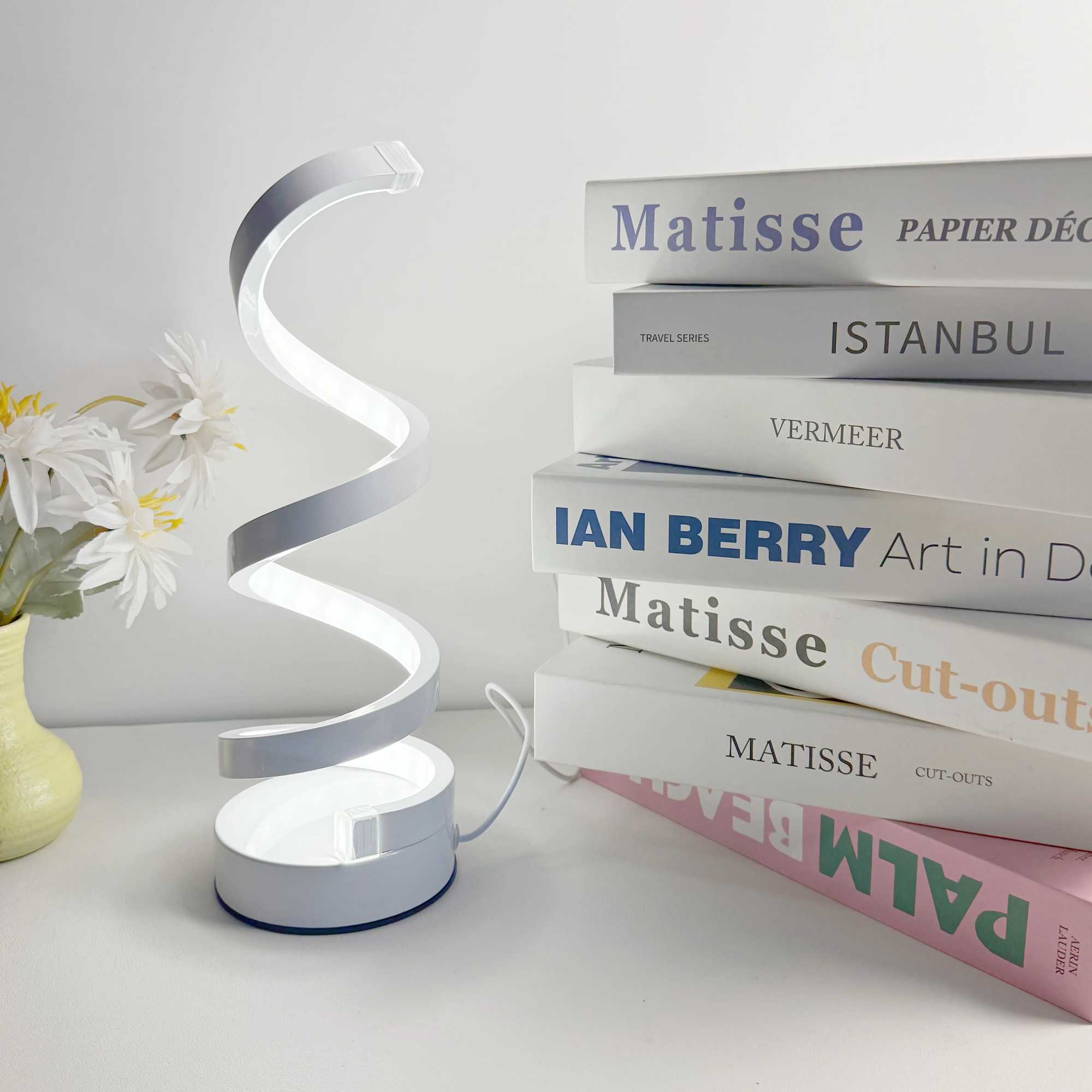 Modern elegant white spiral desktop lamp powered by USB with three-color dimming suitable for various types of rooms. XJ250703