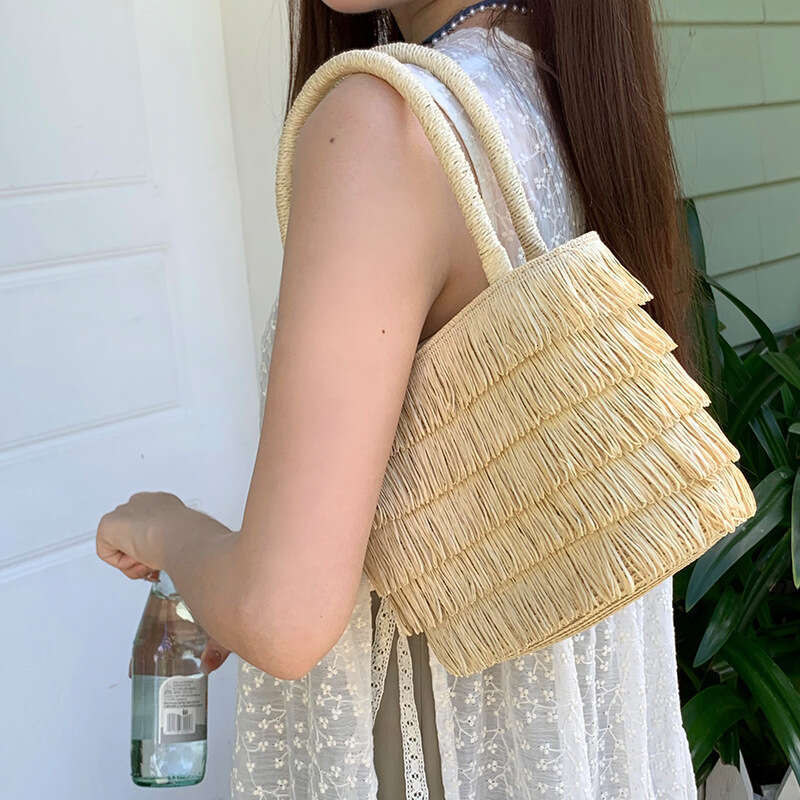 Pastoral Style Handmade Straw Handbag for Women Summer 2025 New French Beach Tassel Woven Bag