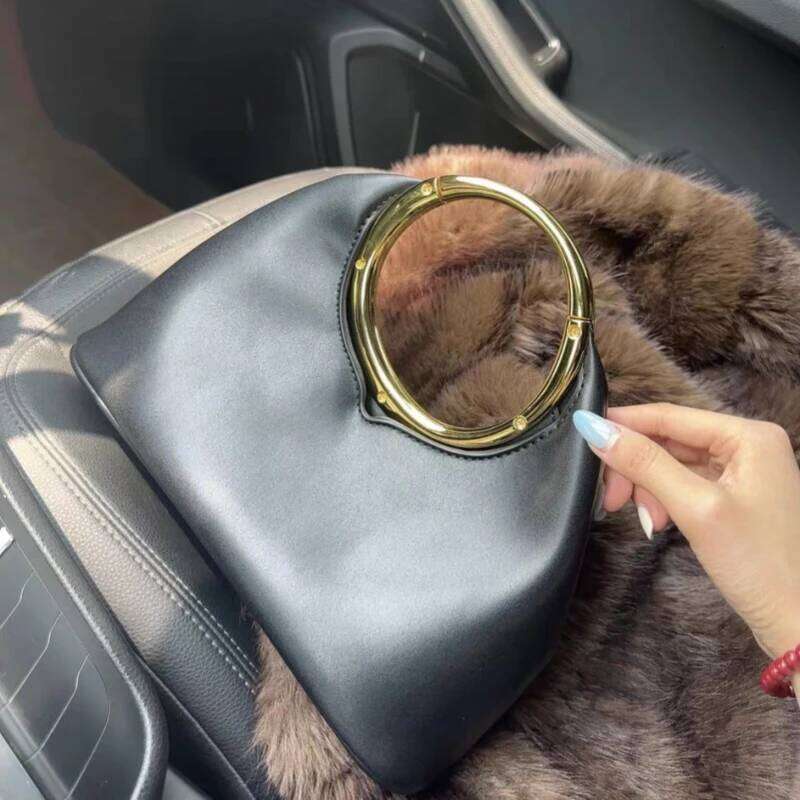 Luxurious designer's spring 2025 collection women's metal handle handbag, half-moon shaped bag in cloud-like design