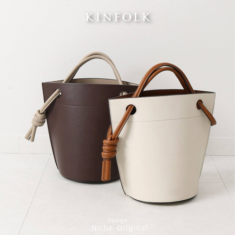 2025 Designer's New Women's Bag With Personalized Structure, Large Capacity, Simple High-end Feel, Underarm Bucket Bag, Color Blocked Handba