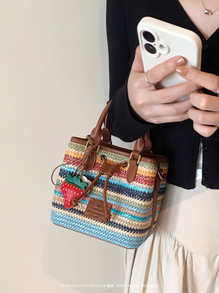 Rainbow colored women's bucket 2025 new woven handbag sweet and versatile spring outing crossbody bag