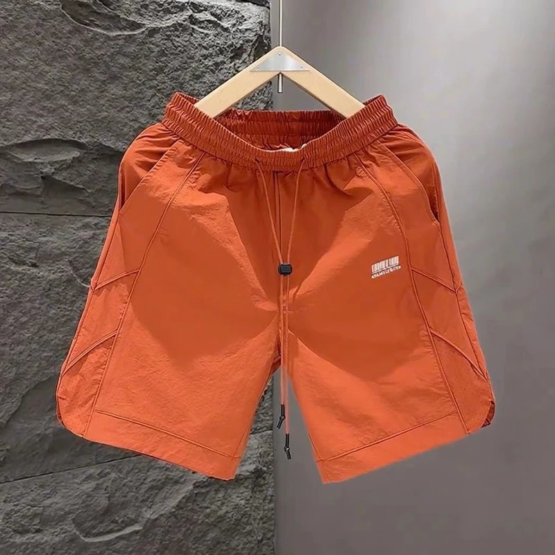 Fashion Elastic Pockets Spliced Embroidery Casual Shorts Mens Clothing Summer Loose Allmatch High Waist Beach Shorts 250704