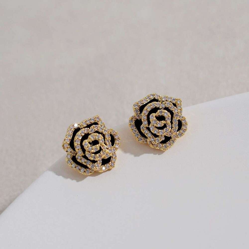 DHcollections Black Small Dia Three-Dimensional Camellia Clip Non-Pierced Style Earrings for Women 2025 New Trendy Ear Accessories Super Fairy Tempera