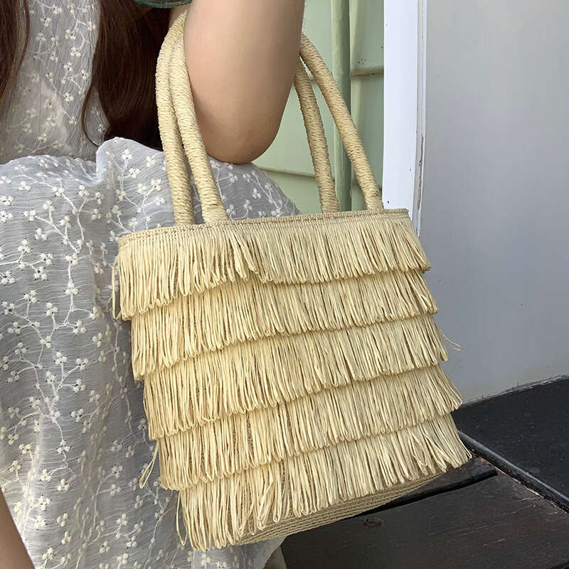 Pastoral Style Handmade Straw Handbag for Women Summer 2025 New French Beach Tassel Woven Bag