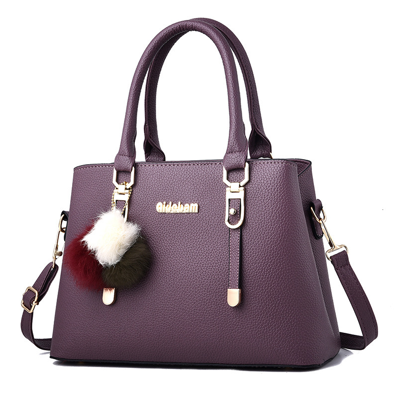 Designer's 2025 New European And American Fashion Large Capacity Women's Handbag Pom Pom Single Shoulder Crossbody Bag Wholesale Free Shippi