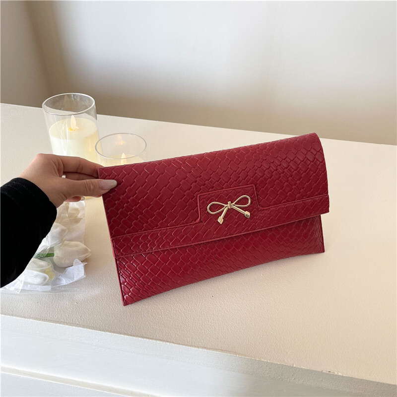 Free Shipping Designer Bag High-end Trendy Personality Fashion Evening Bag For Women Elegant Light Luxury New Urban Commuter Textured Clutch