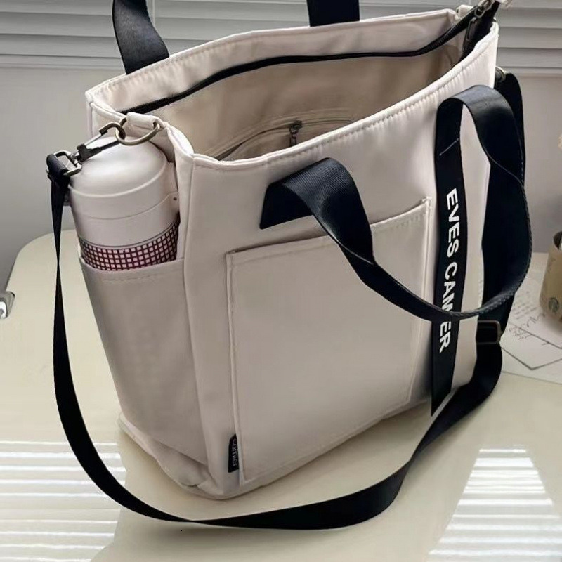 New waterproof fashionable trend handbag canvas crossbody bag trend designer bag fashionable simple multifunctional women s shoulder bag