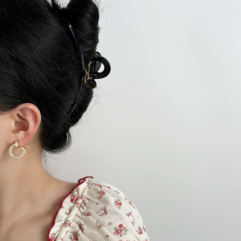 DHCollections Stylish Hoop Earrings Dazzling Metal Round Shape Statement Jewelry For Women