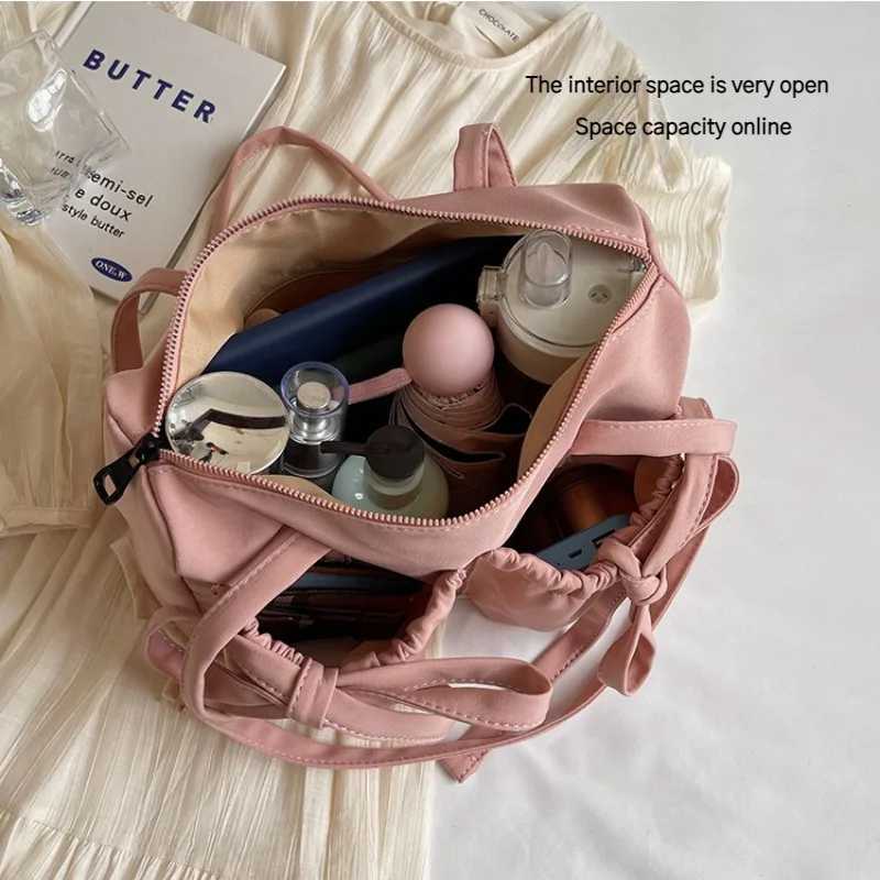 2025 New Korean Bow Nylon Shoulder Bag Fashionable and Sweet Design Tote Bag Folded Large Capacity Commuter Womens Handbag XJ250704