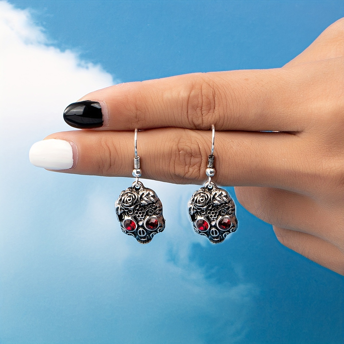 A Pair Of Cute Hip-Hop Red-Eyed Skull Pendant Earrings With Flower Pattern