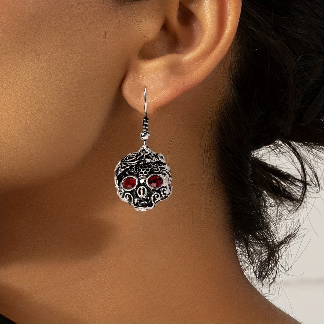 A Pair Of Cute Hip-Hop Red-Eyed Skull Pendant Earrings With Flower Pattern