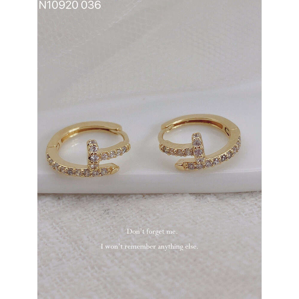 DHCollections Elegant Minimalist Hoop Earrings Modern Chic Dangle Style For Women In Gold And Silver Options