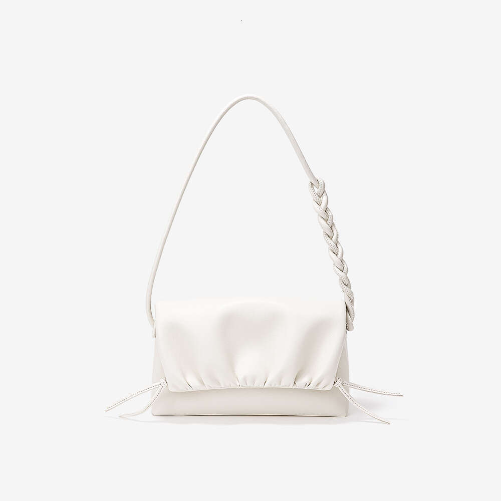 Luxury set new Korean fashion pleated clouds Ins Joker drawstring slung minority design leather ladies shoulder bag.