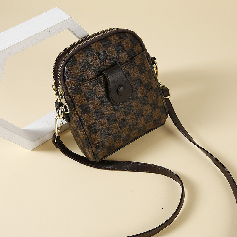 Free shipping designer Phone Bag for Women Crossbody Bag 2025 New Fashion Versatile Vertical Shoulder Bag Lightweight Printed Retro Mini Small Bag