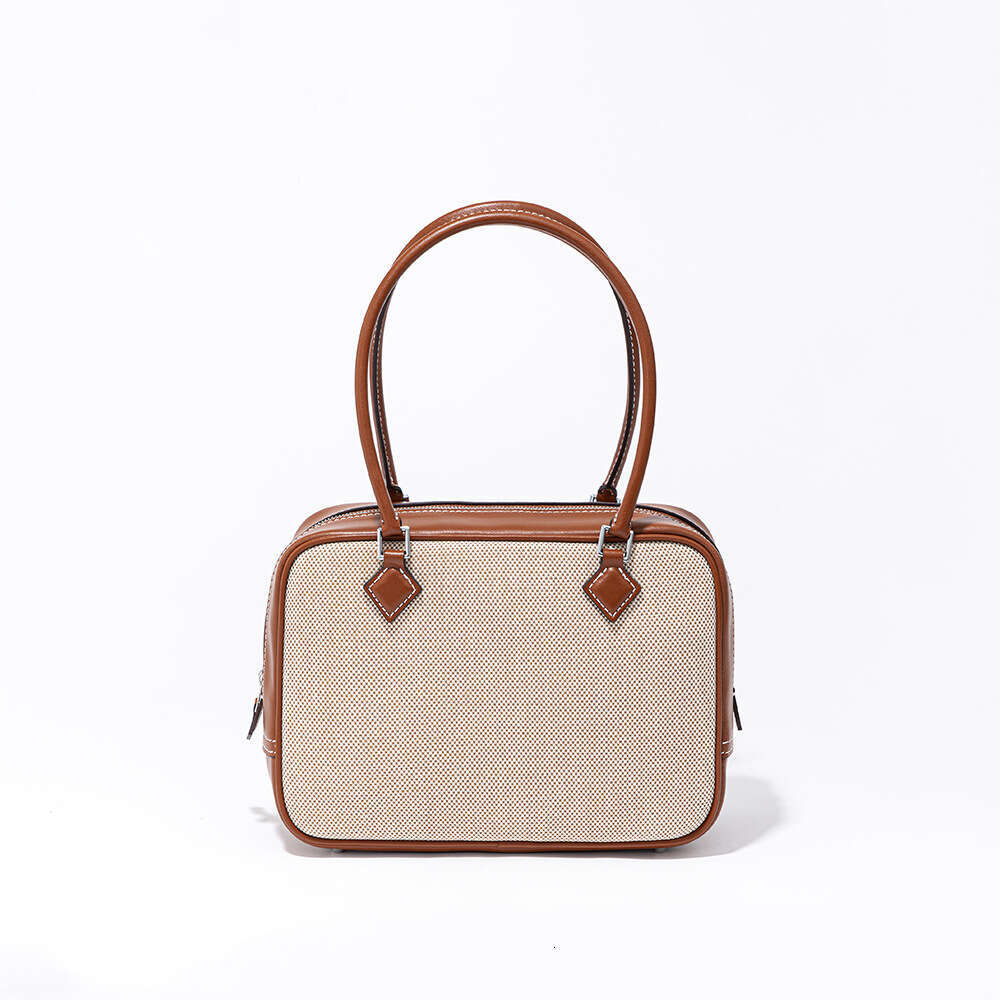 Luxury designer retro canvas patchwork niche feather bag simple high-end leather ladies portable shoulder bag