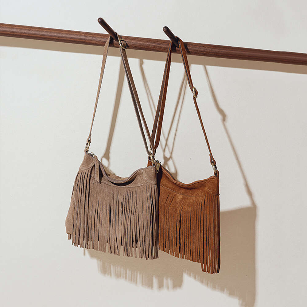 Luxury designer American tassel niche matte cowhide casual slung fashion one-shoulder hot ladies handbag.