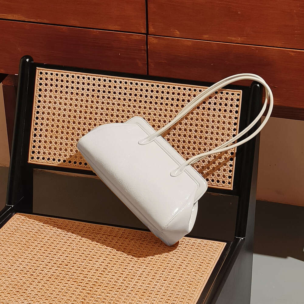 Luxury designer French underarm luxury women's customizable embossed cowhide one-shoulder handbag