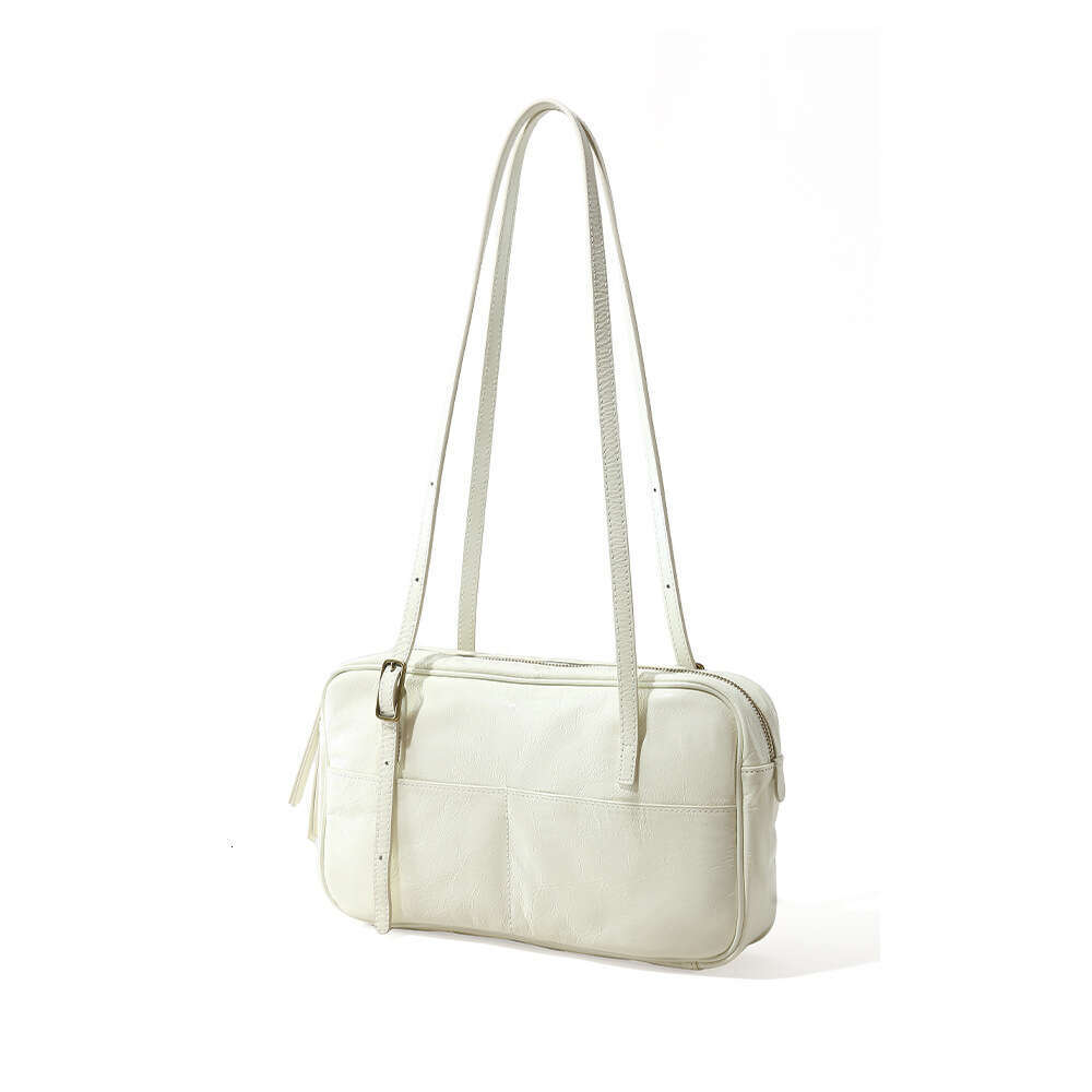 Luxury designer new ladies personality fashion authentic portable waxed leather commuting armpit Korean style large-capacity shoulder bag.