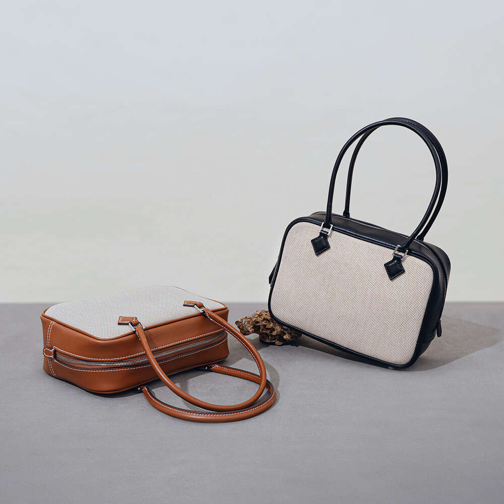 Luxury designer retro canvas patchwork niche feather bag simple high-end leather ladies portable shoulder bag