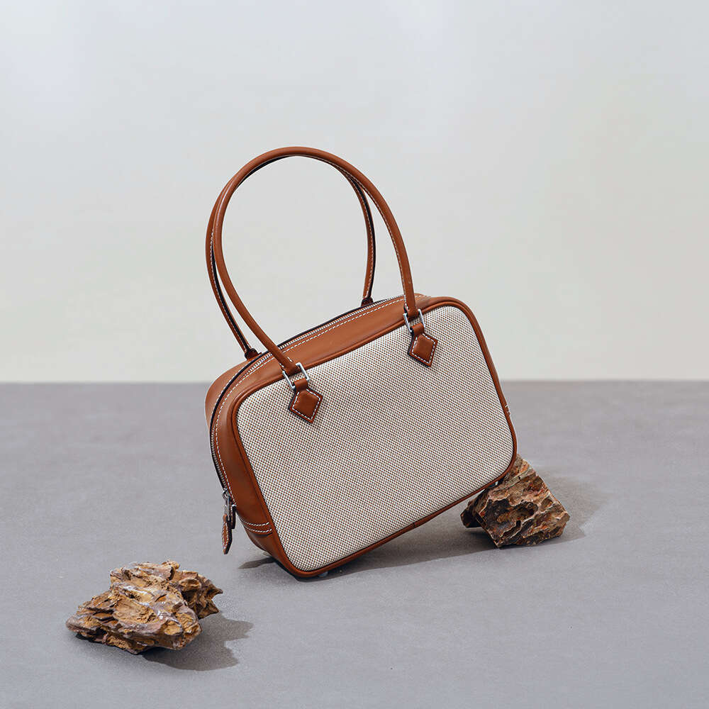 Luxury designer retro canvas patchwork niche feather bag simple high-end leather ladies portable shoulder bag