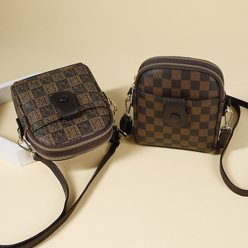 Free shipping designer Phone Bag for Women Crossbody Bag 2025 New Fashion Versatile Vertical Shoulder Bag Lightweight Printed Retro Mini Small Bag