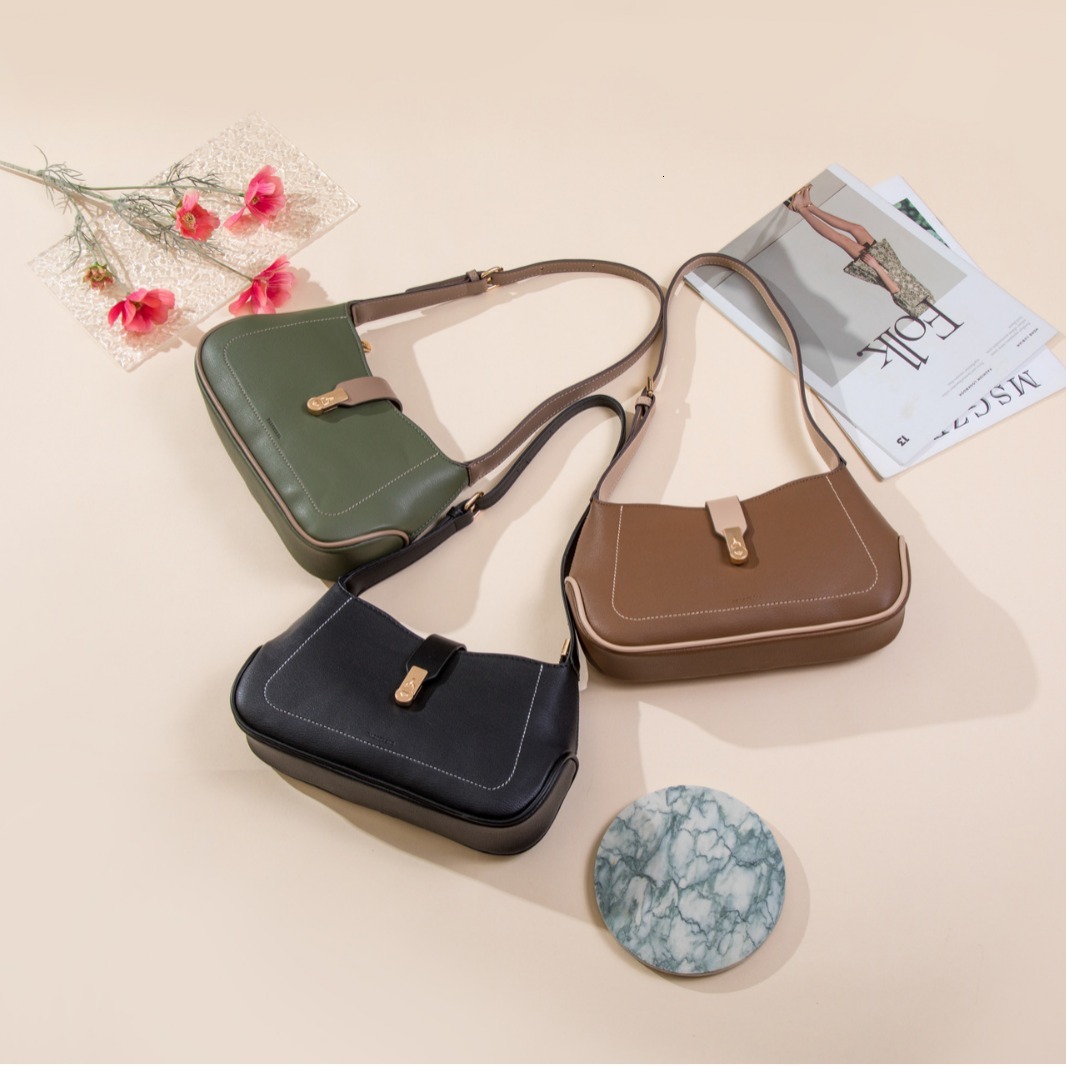 Free shipping designer 2025 New Women Shoulder Bag Large Capacity Buckle Flap Simple Fresh Fashion Versatile Crossbody Bag