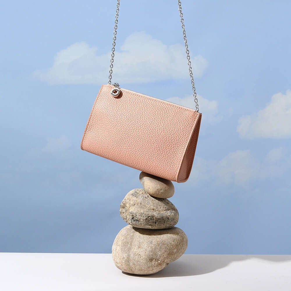 Luxury designer's new underarm cowhide women's commuter simple and fresh handbag with one shoulder