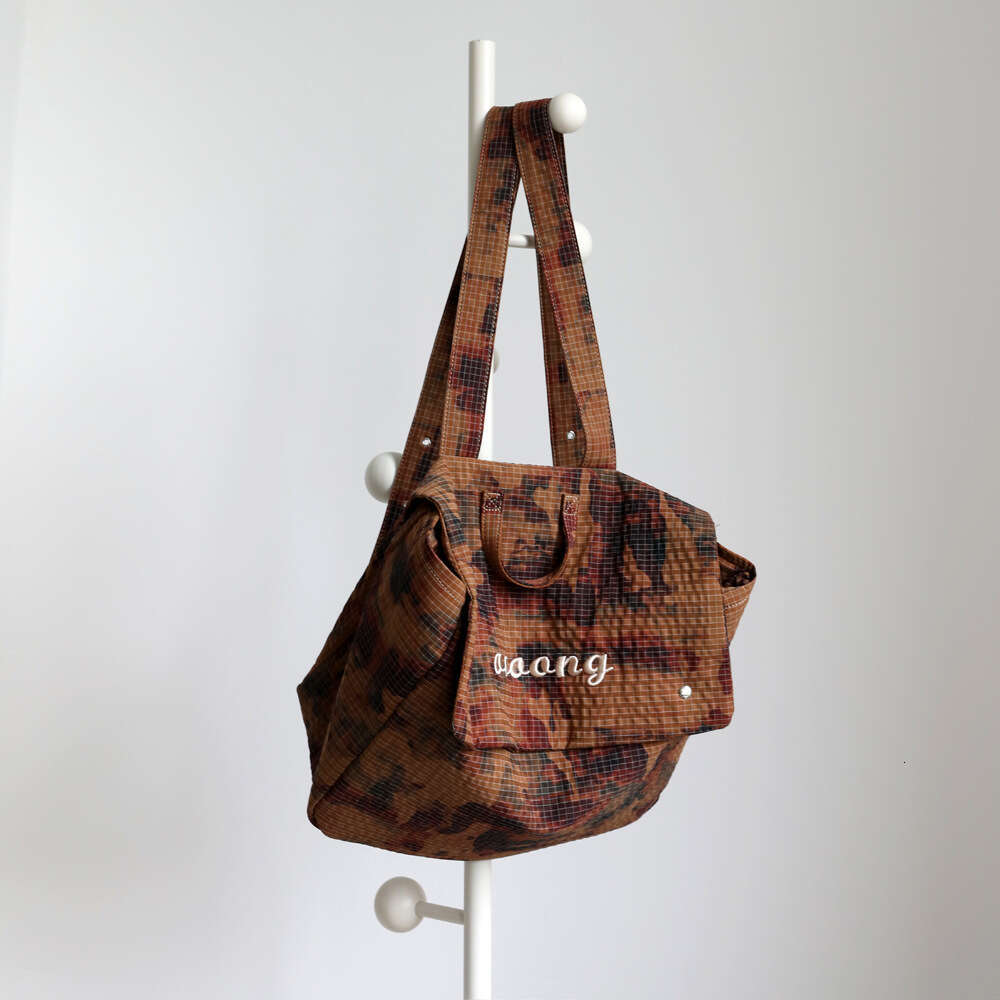 Luxury designer niche camouflage travel large capacity backpack women's new lightweight canvas bag