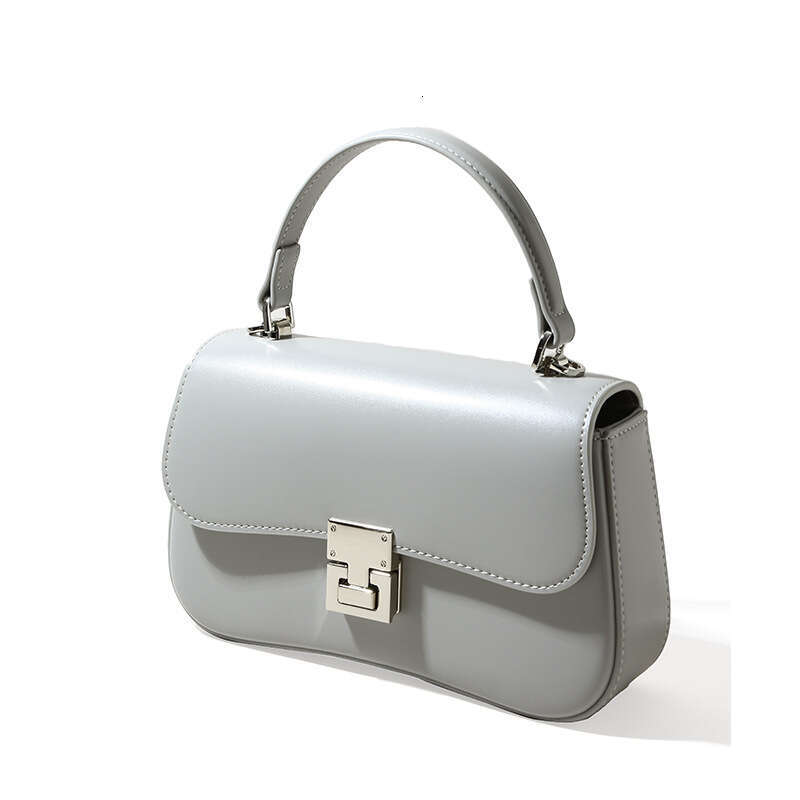 Luxury designer niche women's new cowhide portable spring fashion versatile shoulder messenger simple commuter small square bag