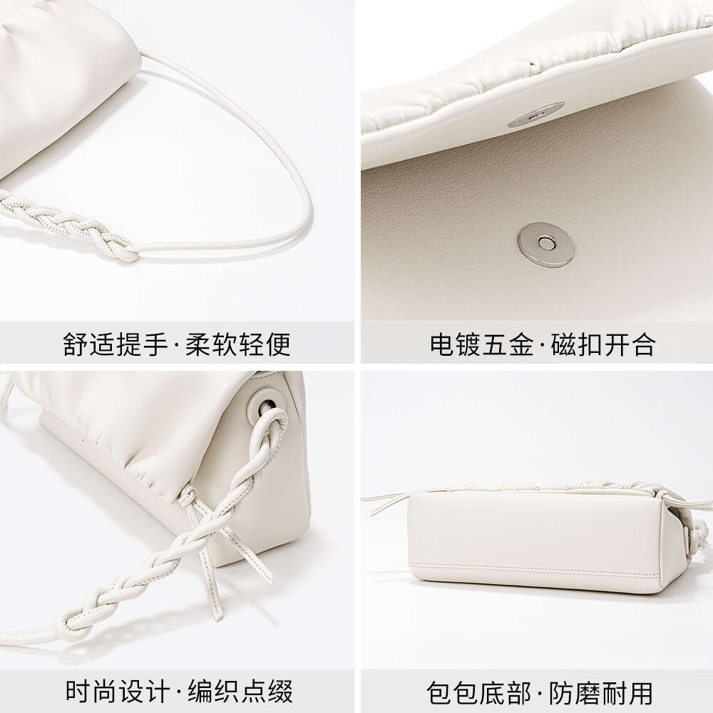 Luxury set new Korean fashion pleated clouds Ins Joker drawstring slung minority design leather ladies shoulder bag.