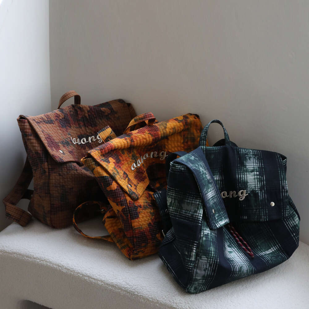 Luxury designer niche camouflage travel large capacity backpack women's new lightweight canvas bag