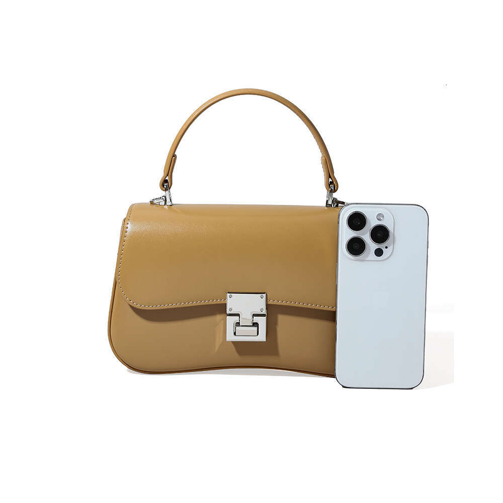 Luxury designer niche women's new cowhide portable spring fashion versatile shoulder messenger simple commuter small square bag
