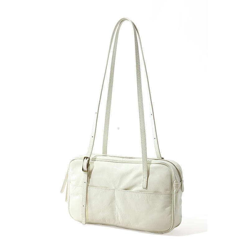 Luxury designer new ladies personality fashion authentic portable waxed leather commuting armpit Korean style large-capacity shoulder bag.