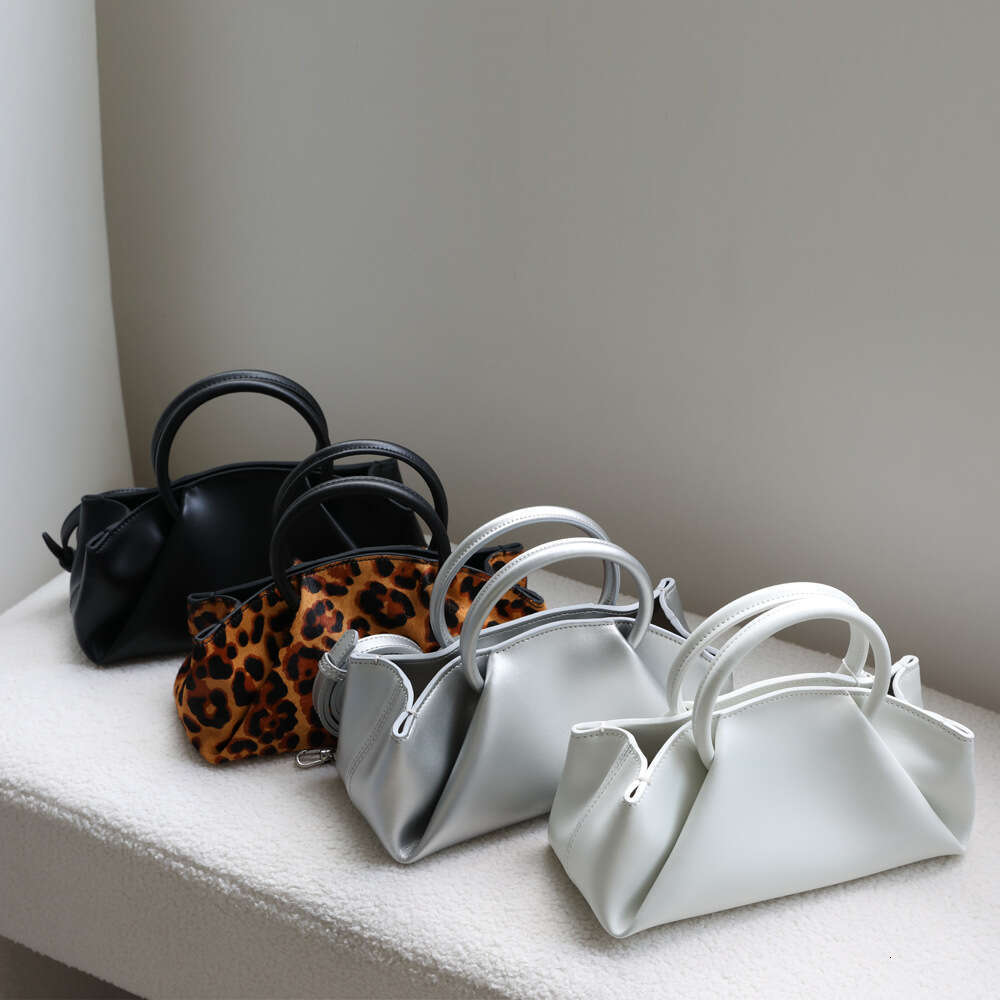 Luxury designer Korean niche lazy leather wrinkles handheld messenger cloud cowhide dumpling bag women's