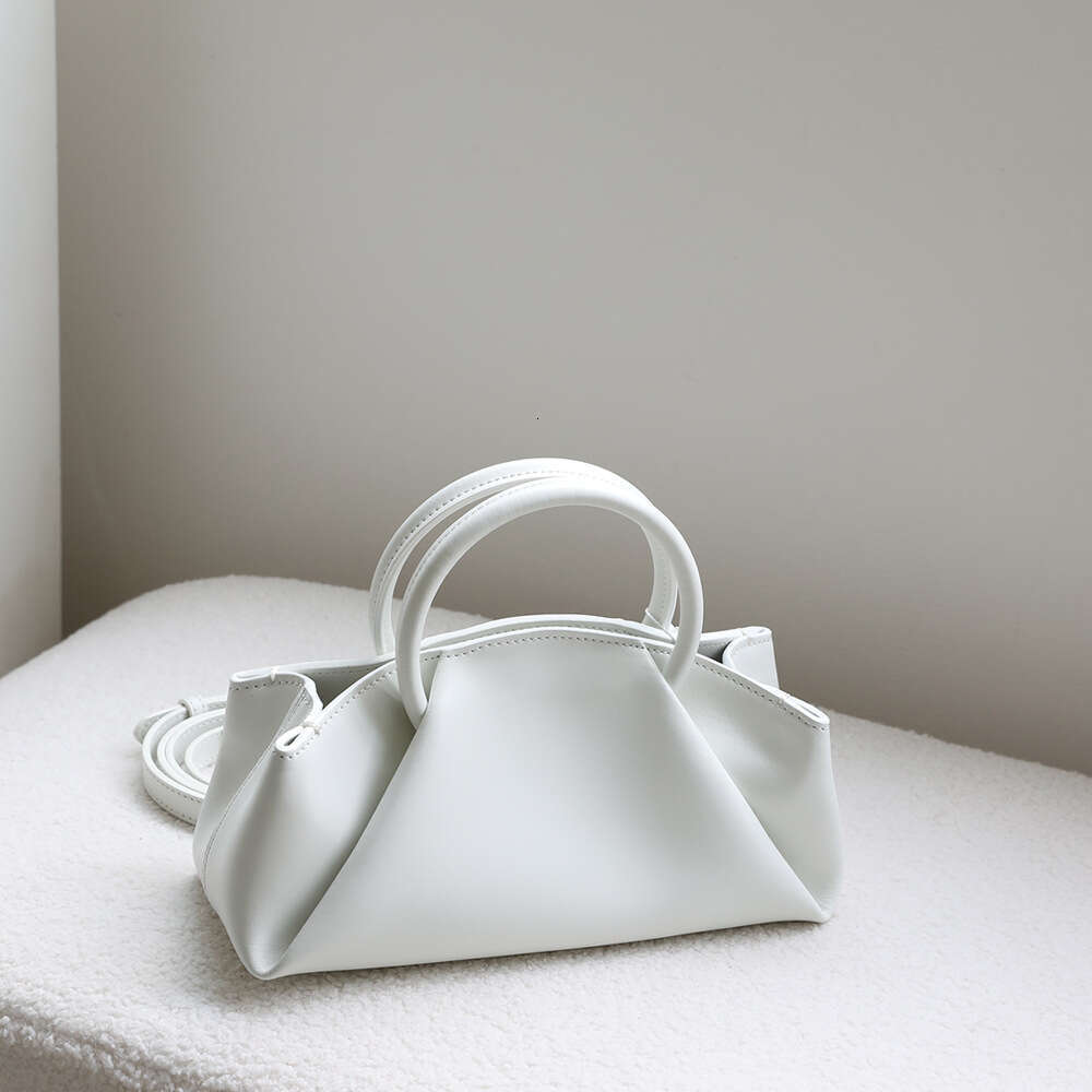 Luxury designer Korean niche lazy leather wrinkles handheld messenger cloud cowhide dumpling bag women's