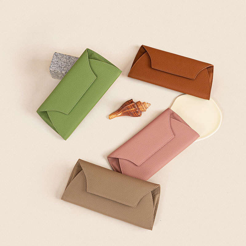 Luxury brand ladies fashion Korean version of the new simple top layer cowhide high-end feel clip multiple card slot wallet.
