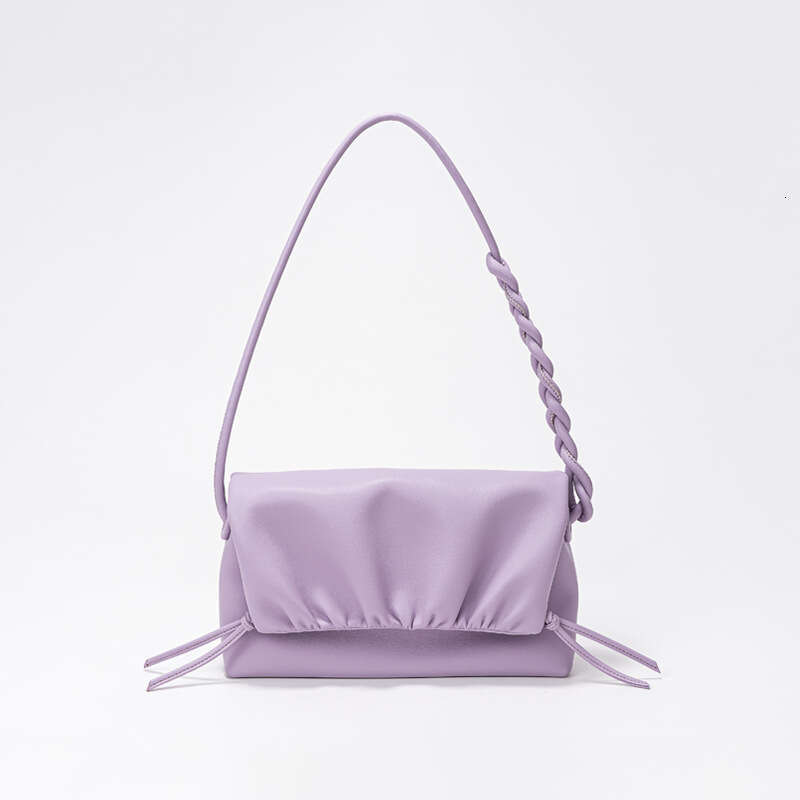 Luxury set new Korean fashion pleated clouds Ins Joker drawstring slung minority design leather ladies shoulder bag.