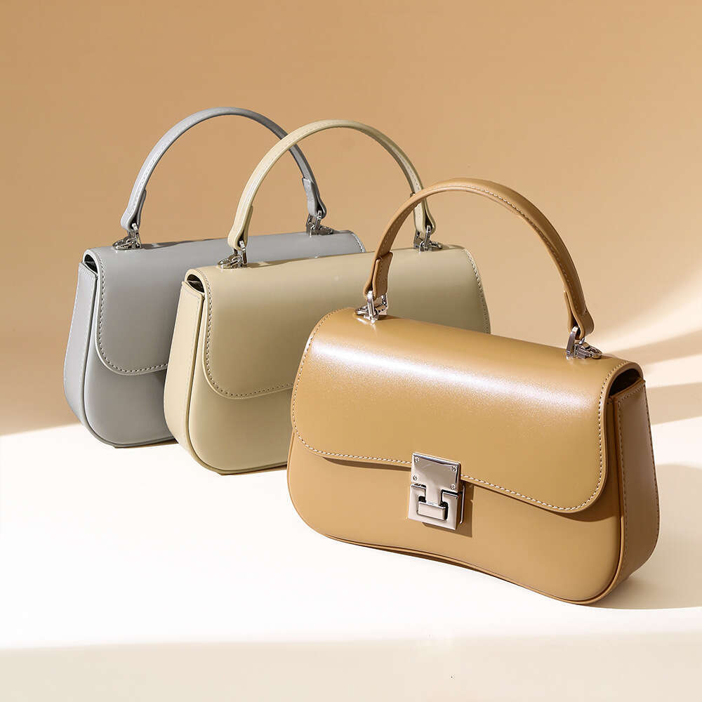 Luxury designer niche women's new cowhide portable spring fashion versatile shoulder messenger simple commuter small square bag